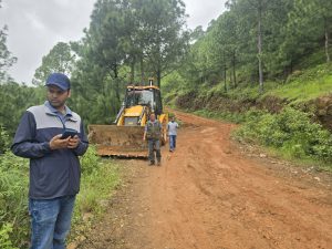 Ganesh Bandari Excavator clearing the way